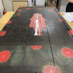 仮額縁をかけに